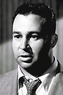 Stanley Prager interpreta Mike