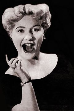 Gloria Wood interpreta Judy Haynes (Singing) (Uncredited)