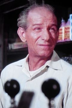 Ned Glass interpreta Toll Booth Attendant
