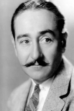 Adolphe Menjou interpreta Mr. Pendergast