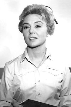 Peggy McCay interpreta Mrs. Grimes