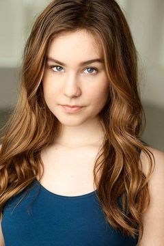 Natalie Precht interpreta Michelle Day