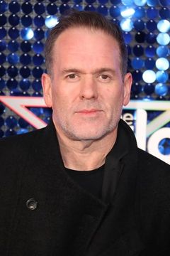 Chris Moyles interpreta Radio 1 DJ (voice)