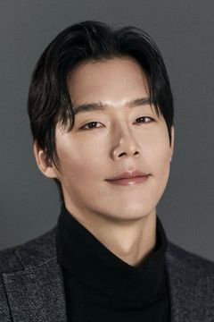 Lee Jin-kyul interpreta Photographer