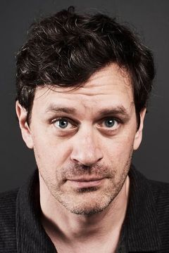 Tom Everett Scott interpreta Sam Garsette