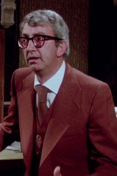 Mario Bartolomei interpreta Megaditta Employee