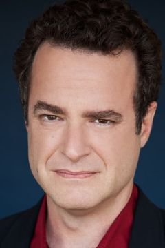 Matt Besser interpreta Larry