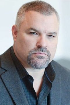 Brad Kelly interpreta Guard (uncredited)