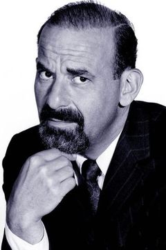 Cliff Norton interpreta Reporter
