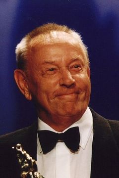 Rijk de Gooyer interpreta Town Official