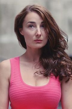 Jeanne Dandoy interpreta Journaliste Elle