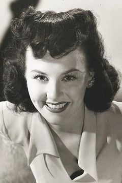 Pamela Blake interpreta (uncredited)