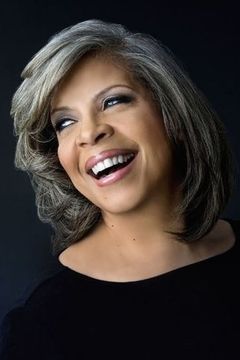 Patti Austin interpreta Millie