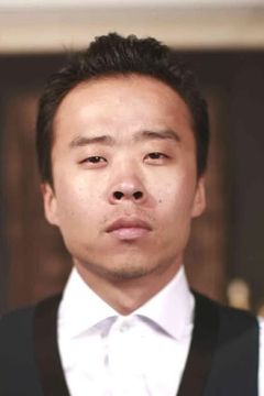 Anatole Yun interpreta Caissier chinois