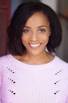 Kimberly Ann Parker interpreta Reporter