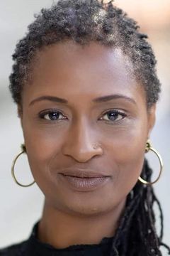 Jacqueline Ramnarine interpreta Bar Patron (uncredited)