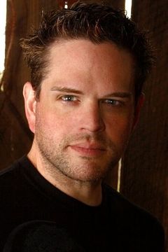 Ron Lester interpreta Reggie Ray