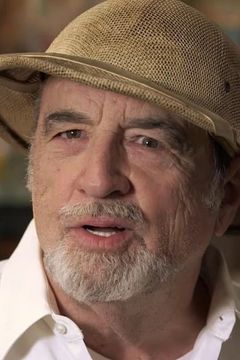 William Richert interpreta Harry Bono