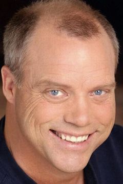 Jim Jackman interpreta Major Asshole