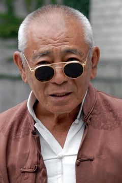 Ku Feng interpreta Fong Ka Ho's Father