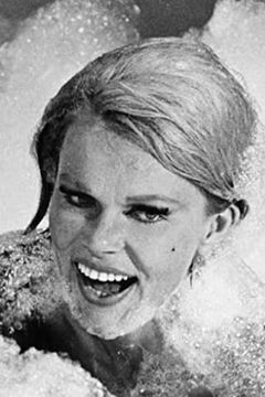 Corinne Cole interpreta Janice Kane