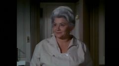 Lillian Adams interpreta Aunt Estelle