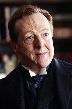 Edward Hibbert interpreta Ackerman