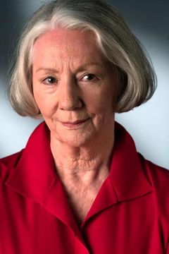 Kay Galvin interpreta Elderly Woman w/Rose