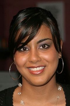 Pooja Shah interpreta Meena