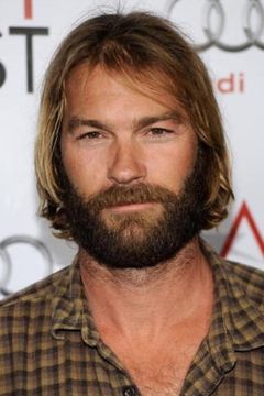 Andrew Wilson interpreta Cop