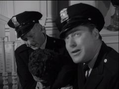 Will J. White interpreta State Police Sergeant Bill Ames (uncredited)