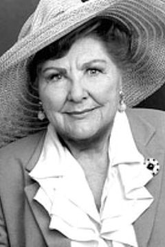 Justine Johnston interpreta Mrs. Whitman