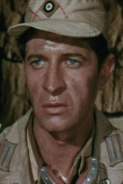 Julio Pérez Tabernero interpreta Baxter Gunman (uncredited)