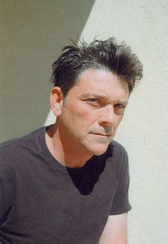 Michael Clossin interpreta Tinker (uncredited)