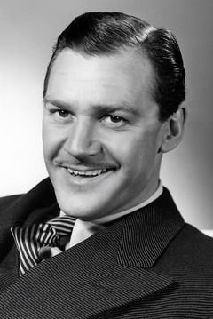 Douglas Fowley interpreta Roscoe Dexter
