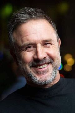 David Arquette interpreta Rob Geller