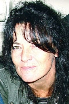 Anne Conti interpreta Bucquoy's wife