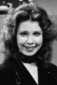 Ann Risley interpreta Woman #1