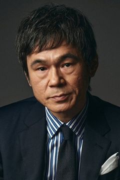 Masahiro Koumoto interpreta Bar Owner