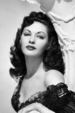 Yvonne De Carlo interpreta Girl in Cafe (uncredited)