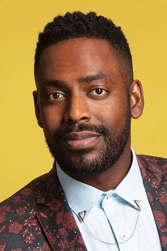 Baron Vaughn interpreta Party Goer