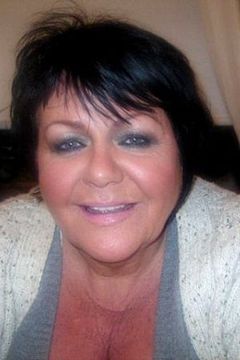 Edna Caskey interpreta Officer Evans