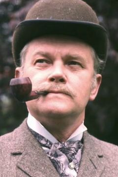 Nigel Stock interpreta Rupert T. Waxflatter