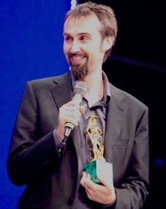 Giuliano Taviani interpreta Giocatore poker