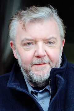 Tony Haygarth interpreta Milo Renfield