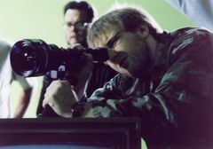 Colin Strause interpreta S.H.I.E.L.D. Agent #4 (uncredited)
