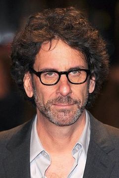 Joel Coen interpreta Drive-in guard #1