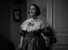 Leila McIntyre interpreta Mrs. Langhorn