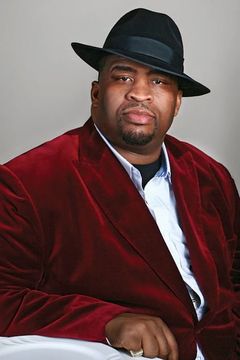 Patrice O'Neal interpreta Gus