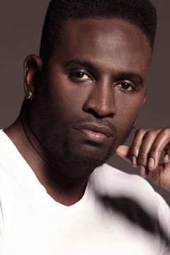 Anwan Glover interpreta Slim Charles